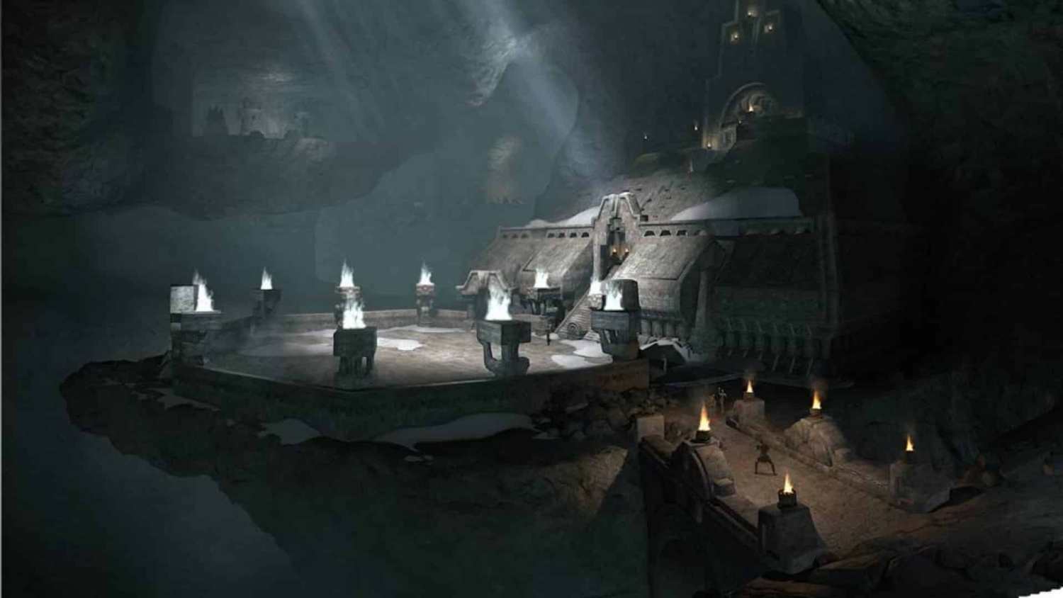 Large dark underground arena with stone architecture and flaming pillars illuminating the space