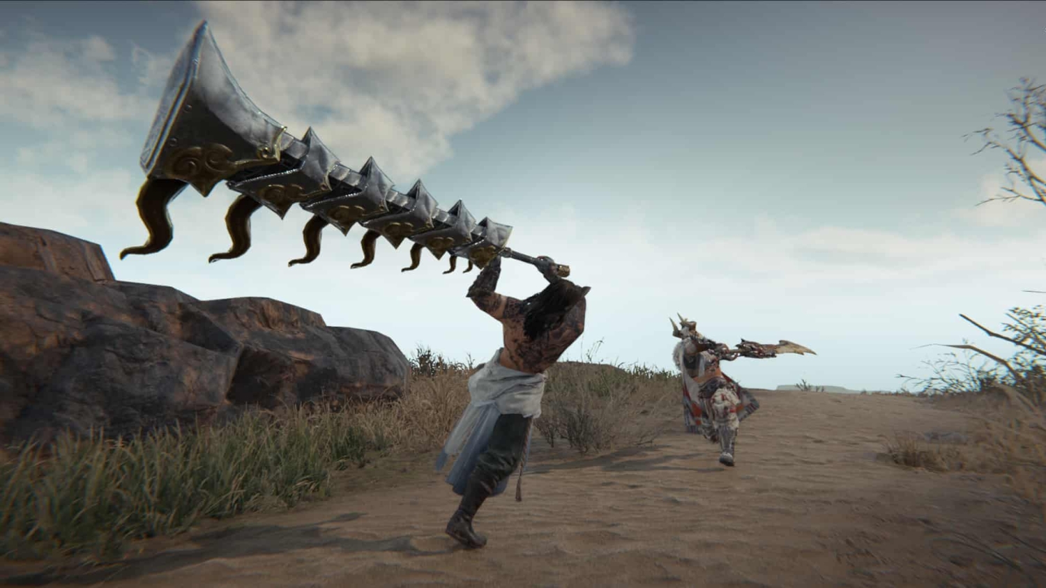 Two warriors in fantasy armour engaged in battle on a sandy path, one wielding an oversized weapon