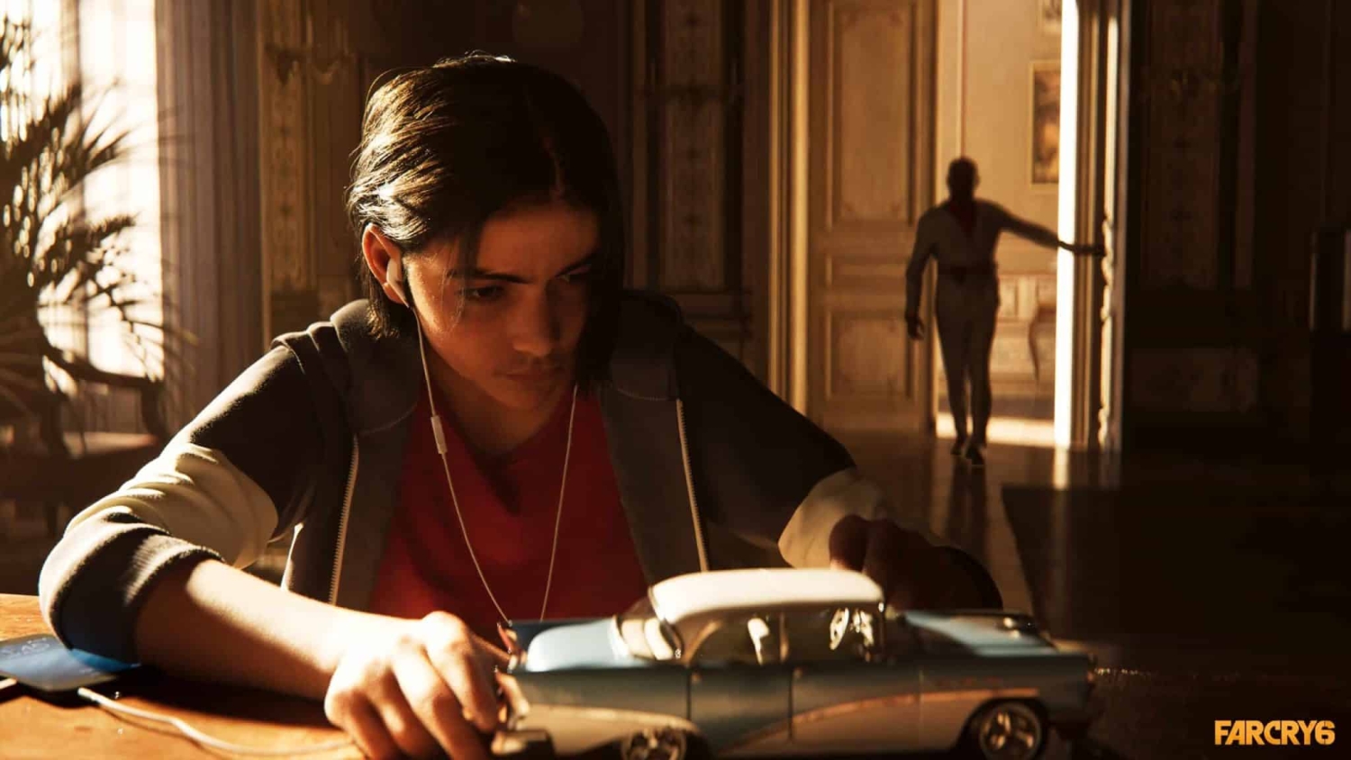 Young person focused on playing with a toy car while listening to music in a warmly lit vintage room