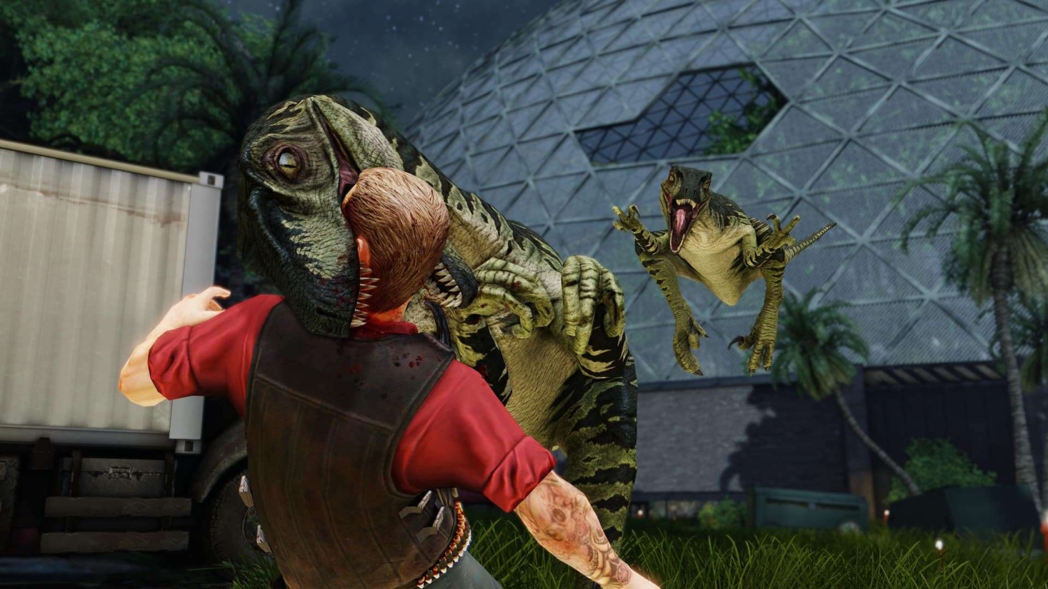 Two aggressive dinosaurs attack a man near a large glass dome structure at night