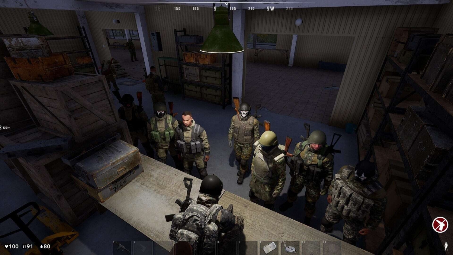 A group of nine armed soldiers in camouflage and tactical gear stand together inside a dimly lit storage room with crates and shelves