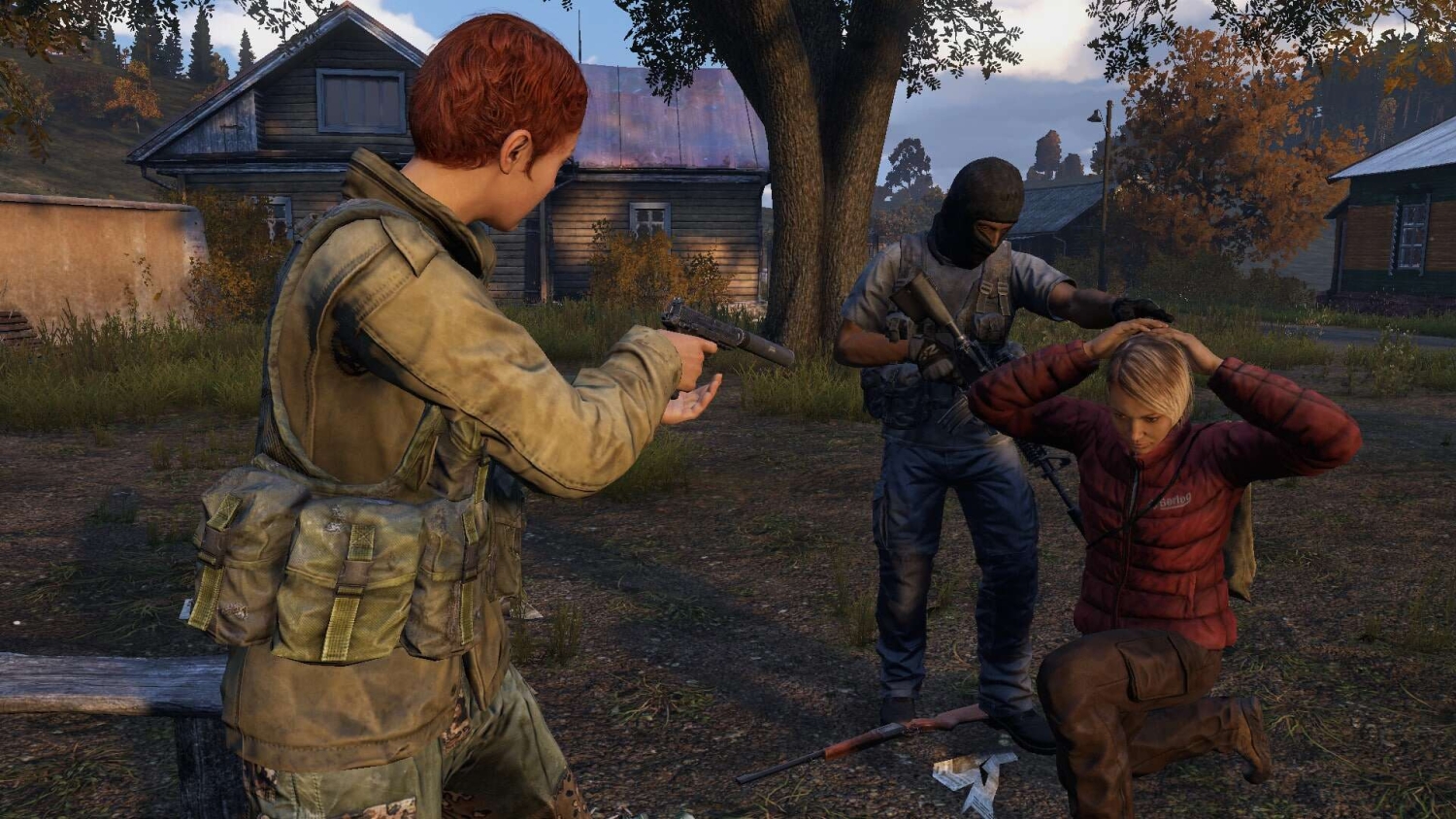 Two armed characters detain a kneeling person with hands on head in a village at dusk