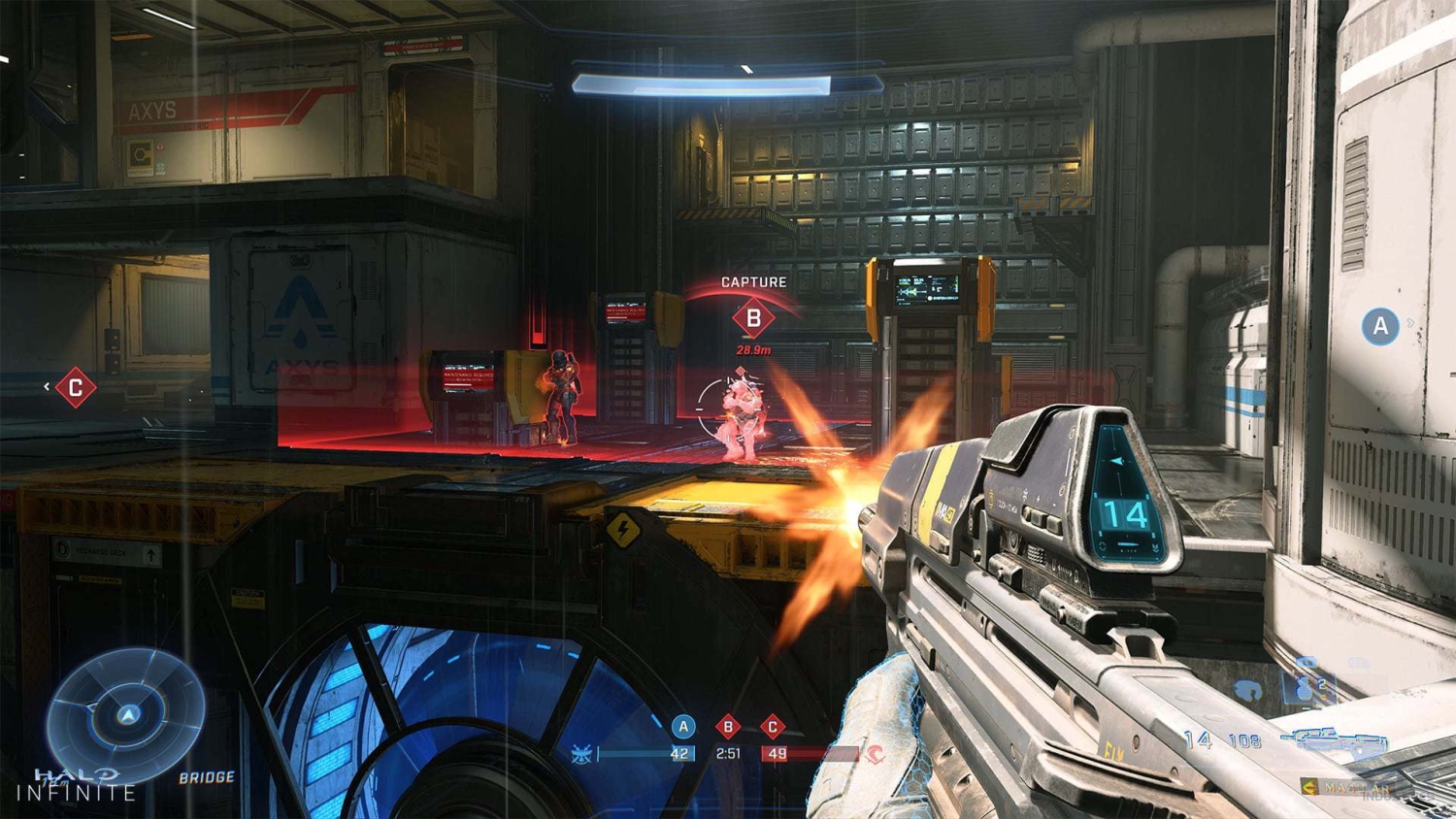 First-person shooter view firing assault rifle at enemies near capture point B in a futuristic indoor map
