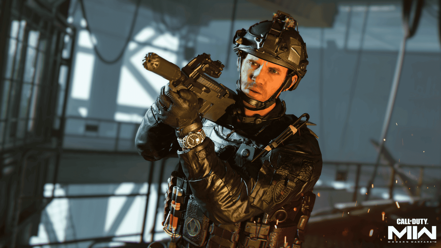 Soldier in tactical gear aiming a silenced weapon inside a dimly lit industrial building