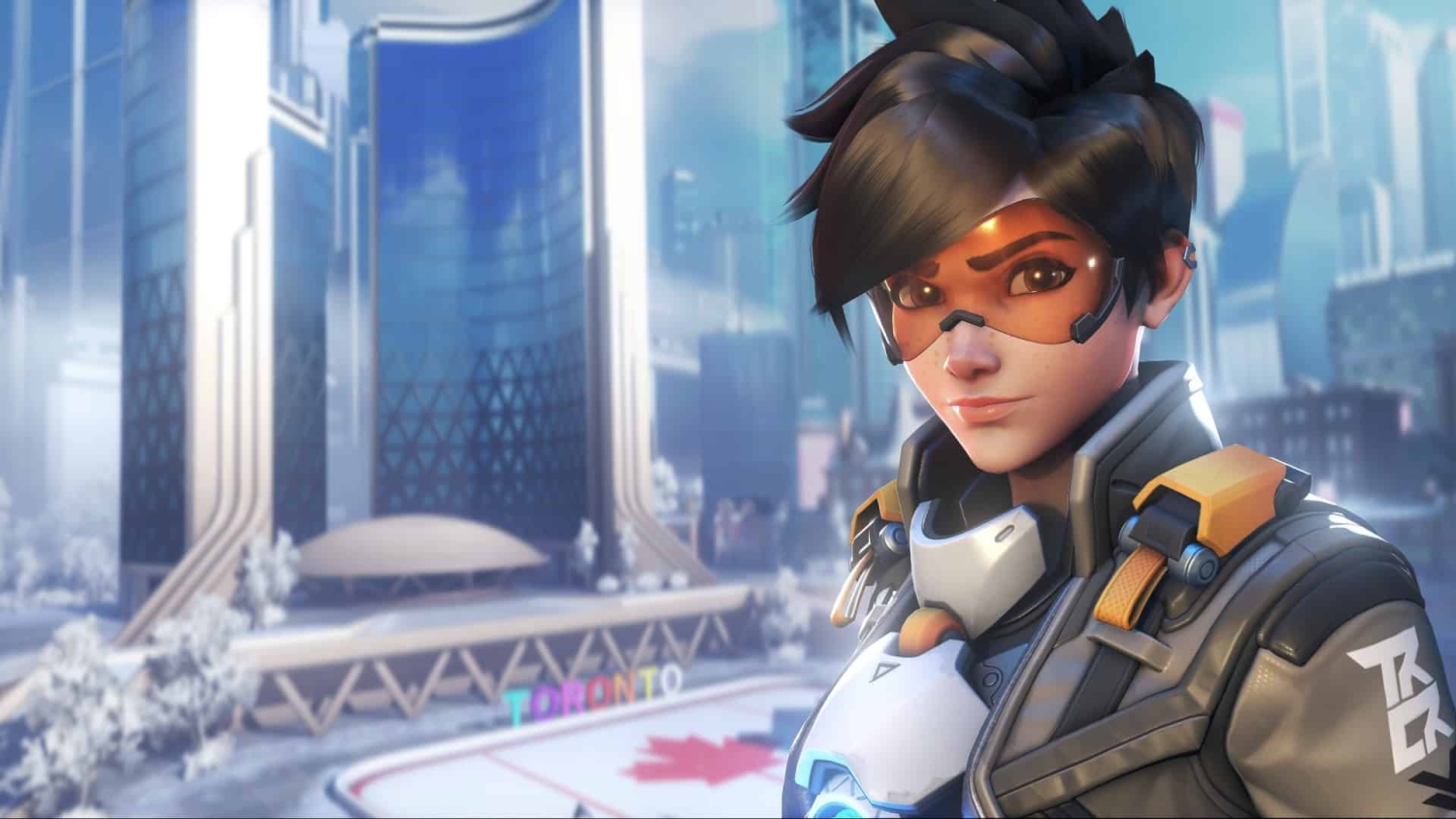Futuristic female character with short black hair and orange visor stands in front of a snowy Toronto city background