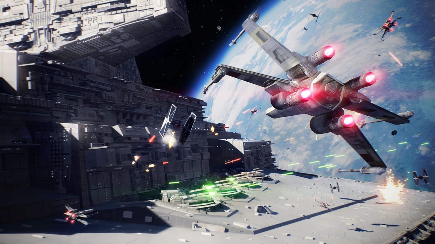 X-wing and TIE fighters engaged in space combat near a large starship above planet surface
