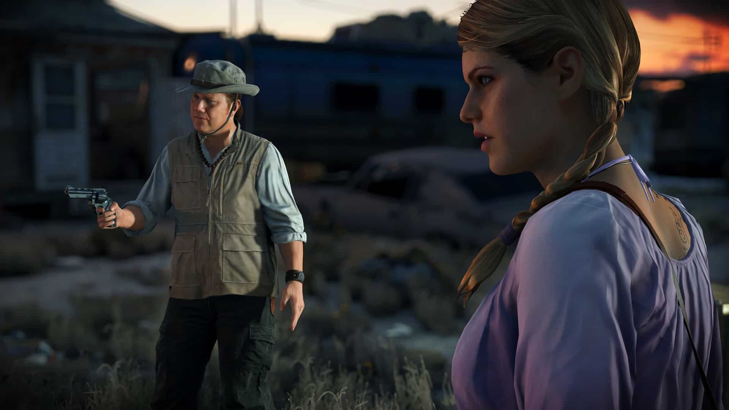 Man wearing safari hat aims revolver while woman with braided hair watches in desert at dusk