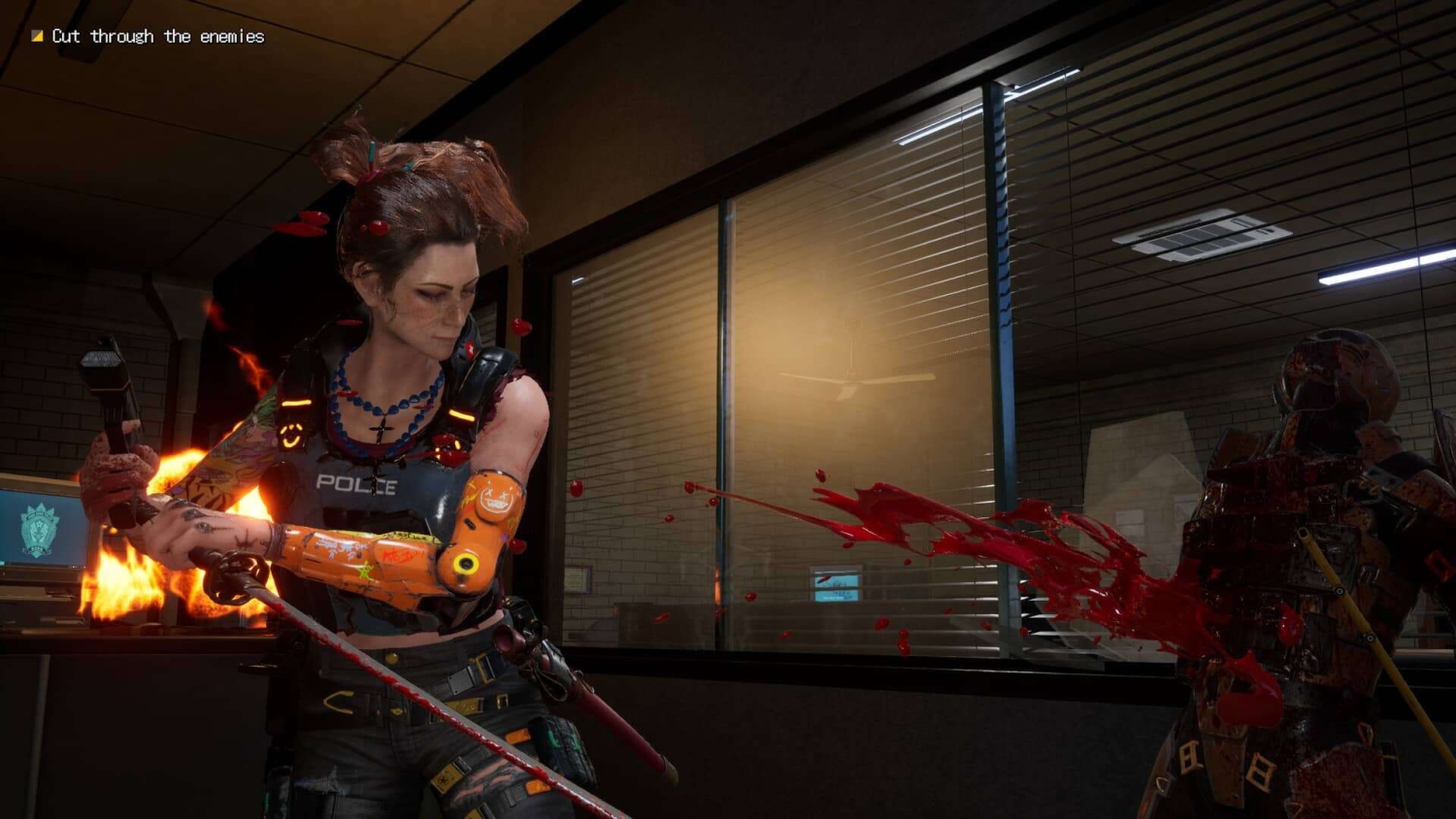 Cyborg police woman with tattooed arm swings bloodied sword at armoured opponent inside an office at night
