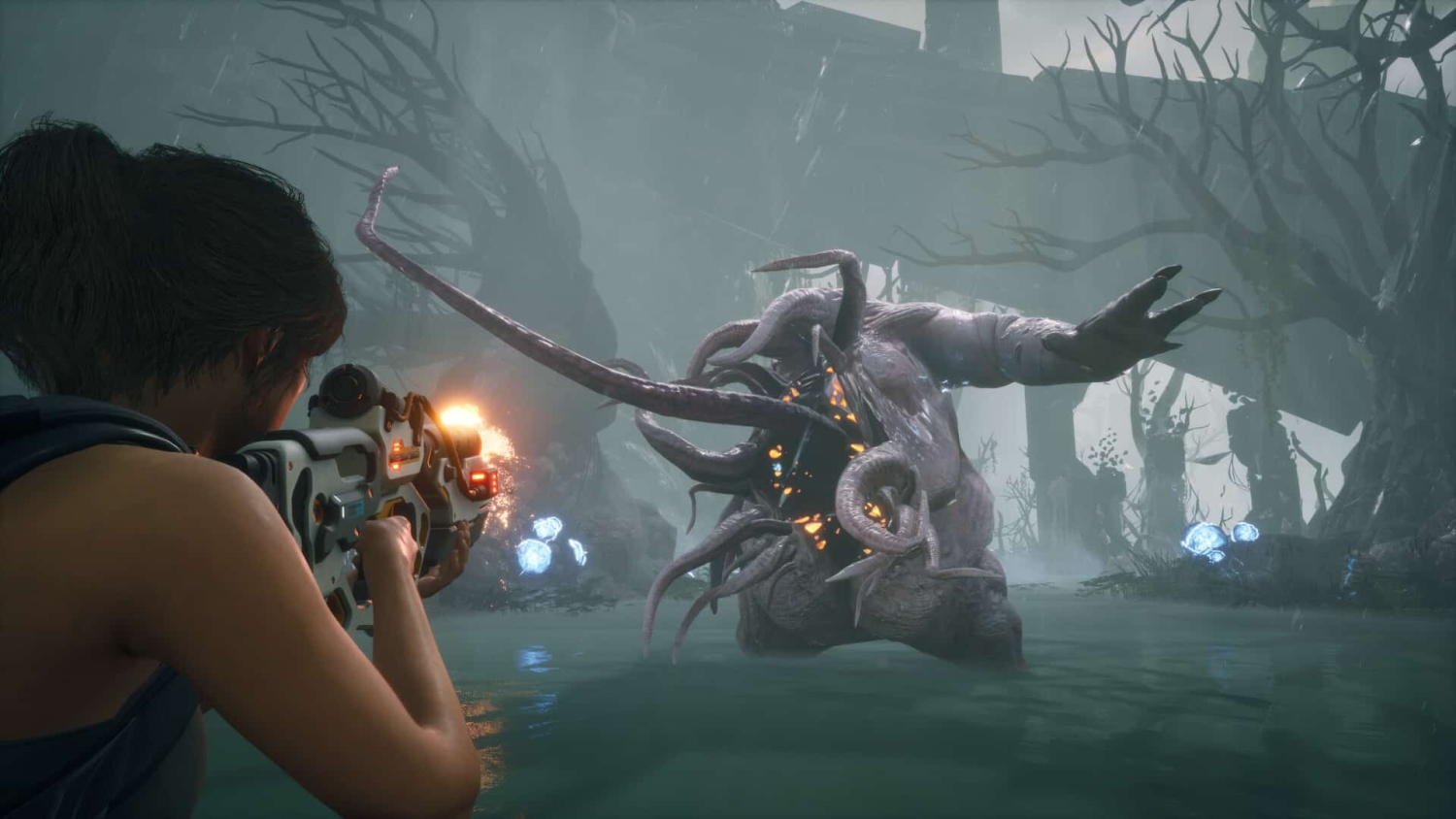 Person fires high-tech gun at a large tentacled monster emerging from swamp water surrounded by twisted trees