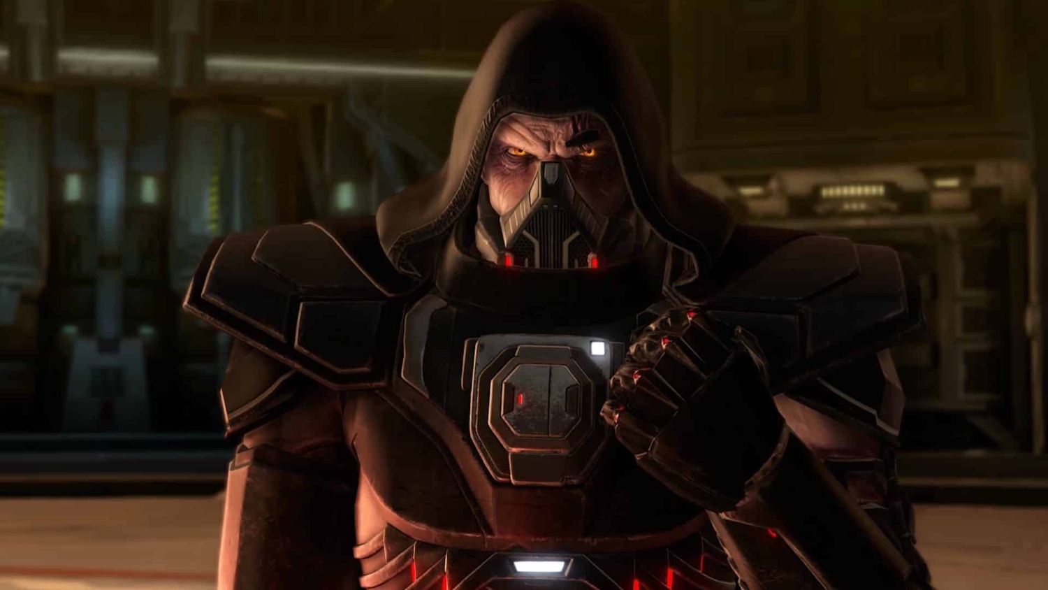 Armoured figure in dark hood with glowing yellow eyes clenches fist inside dimly lit futuristic room
