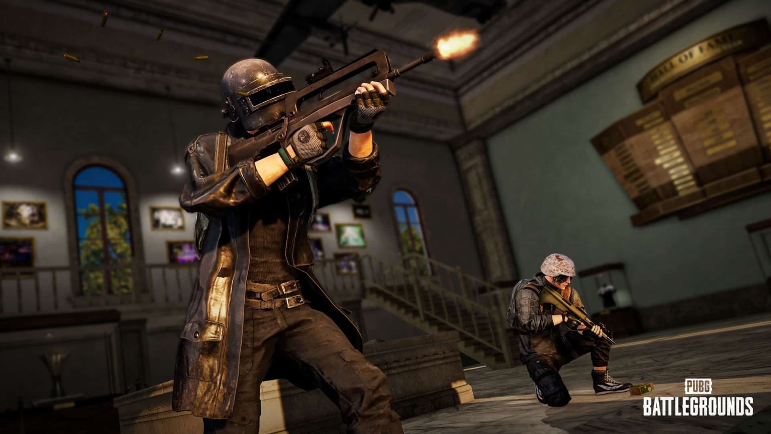 Two armed players in combat inside a large, ornate building in PUBG: Battlegrounds