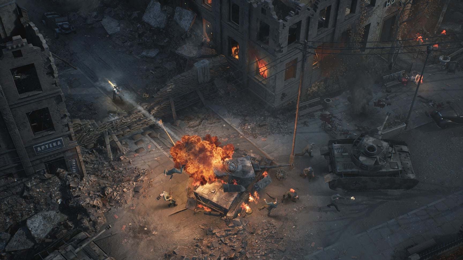 Soldiers engaged in urban warfare as a tank explodes amidst rubble and burning buildings