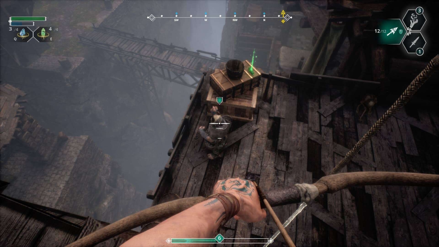 First-person view aiming a bow at an enemy on a wooden platform in a foggy mountainous area