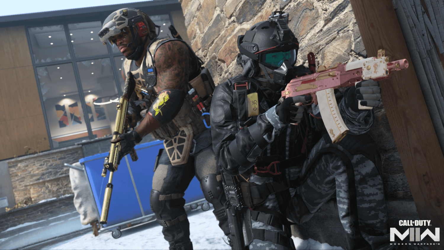 Two soldiers in tactical gear take cover and aim weapons beside a stone wall in a snowy urban setting