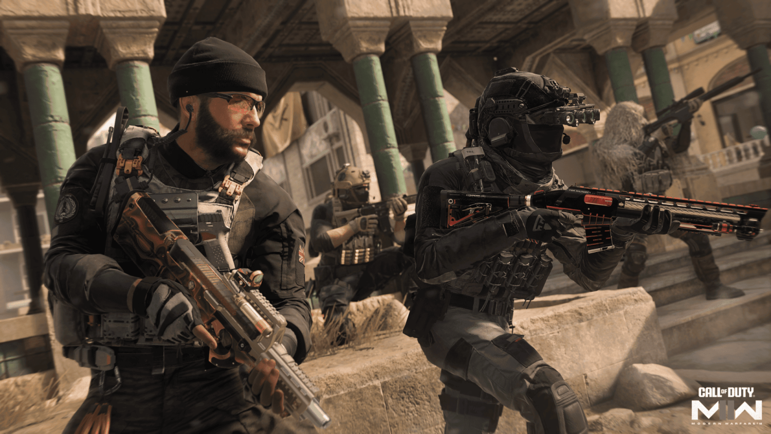 Four soldiers in tactical gear advancing cautiously through a stone-pillar building in an urban environment