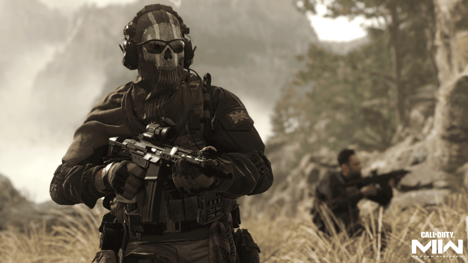 Soldier wearing skull face paint and headset aiming rifle in rocky outdoor terrain with another soldier crouched behind