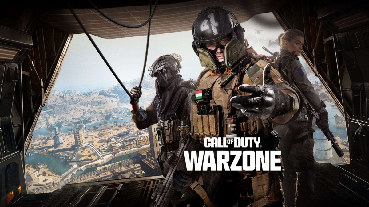 Three armed soldiers in tactical gear stand in open aircraft with large landscape of a city and water below