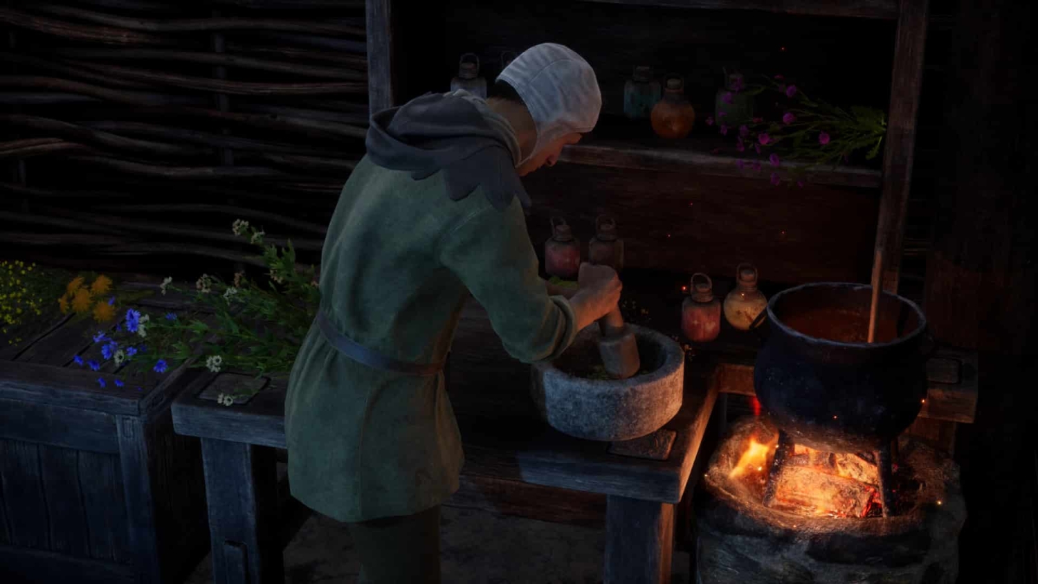 Person wearing medieval-style clothing grinding herbs in a stone mortar near a cauldron over an open fire