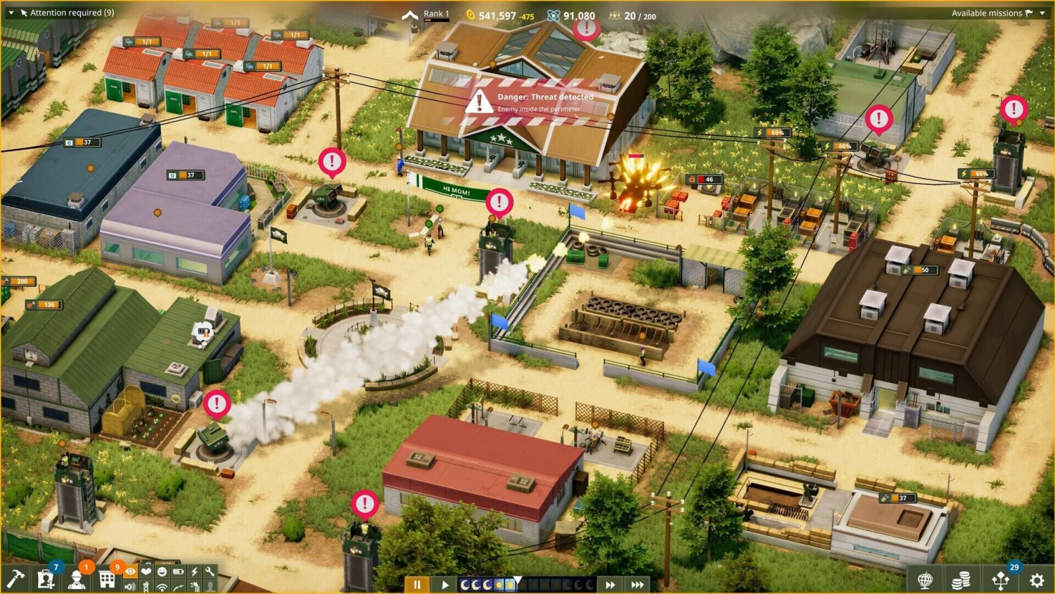 Top-down view of a military base with explosions, warning icons, and defensive turrets active