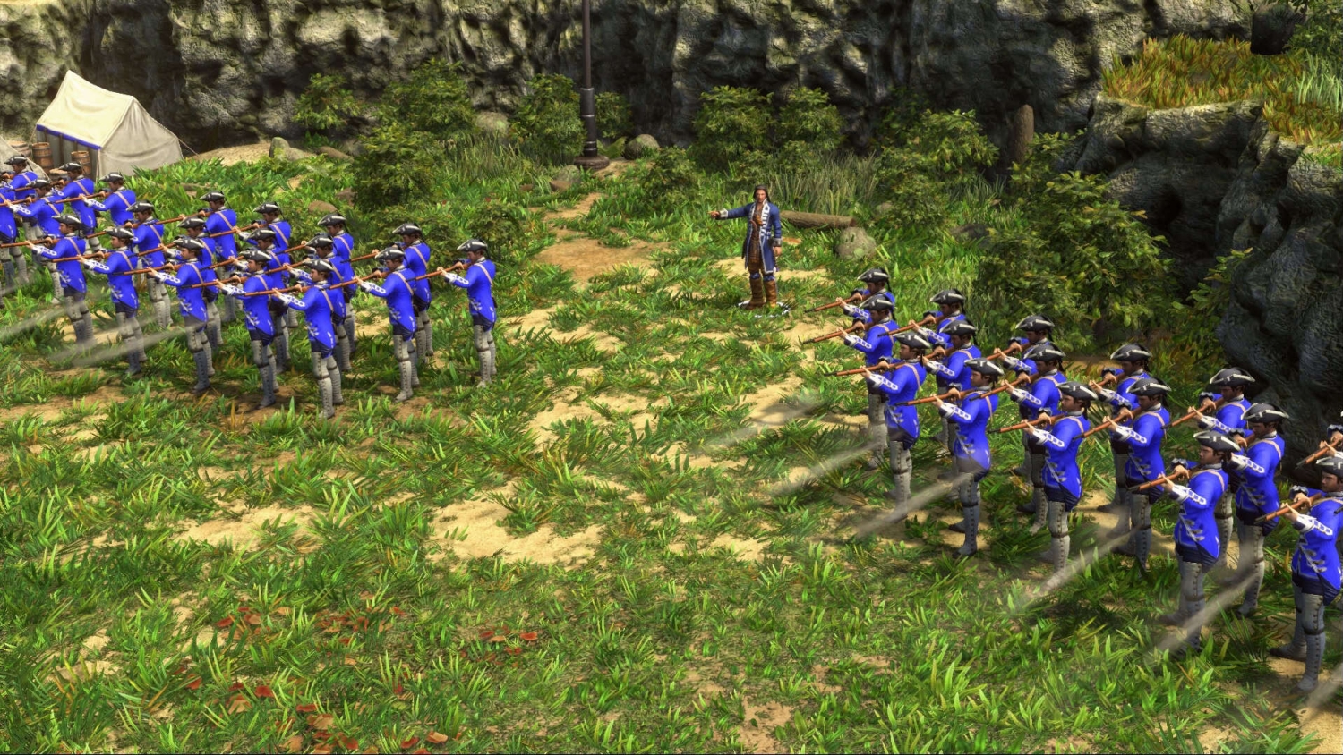 Two lines of soldiers in blue uniforms with muskets aiming forward led by an officer in a wooded clearing