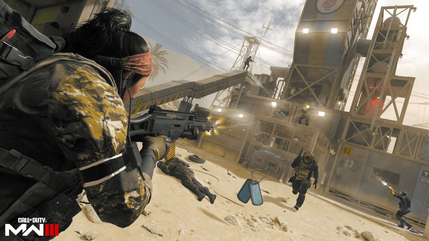 Soldier in yellow camouflage firing a rifle at armed enemies near a desert industrial structure