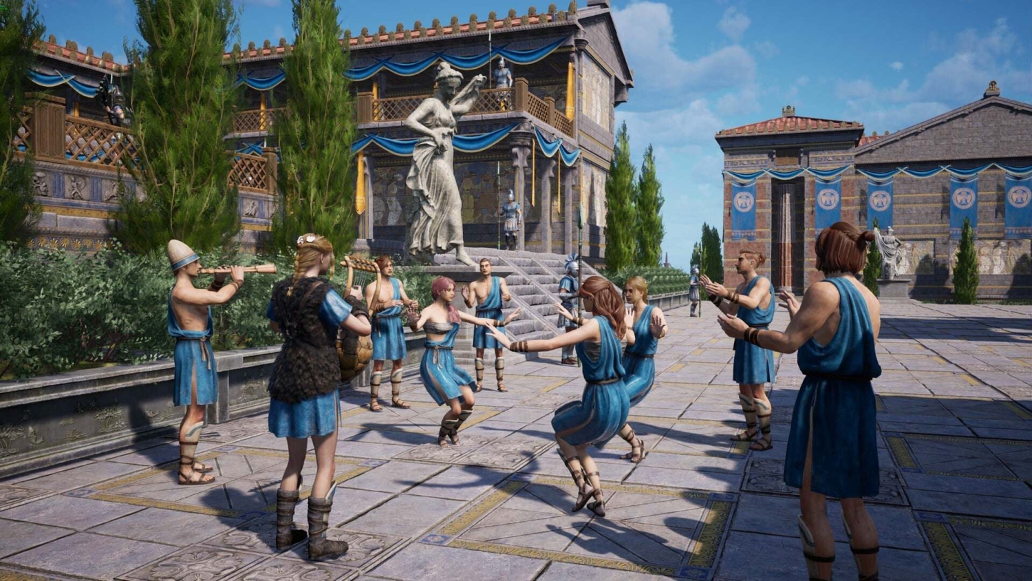 People in blue Greek-style tunics playing instruments and dancing in a courtyard with statues and banners