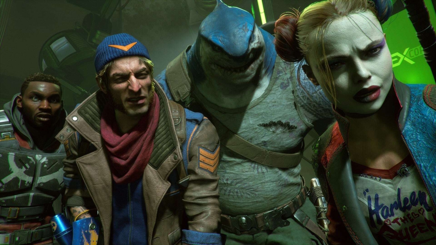 Close-up of four Suicide Squad characters in a dimly lit setting with intense expressions and distinctive costumes