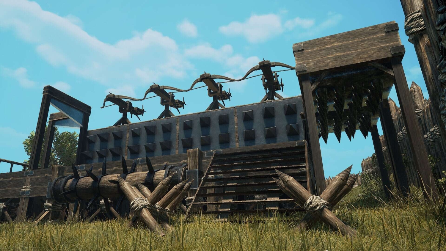 Defensive wooden barricade equipped with four mounted crossbows and sharp wooden spikes under a clear blue sky