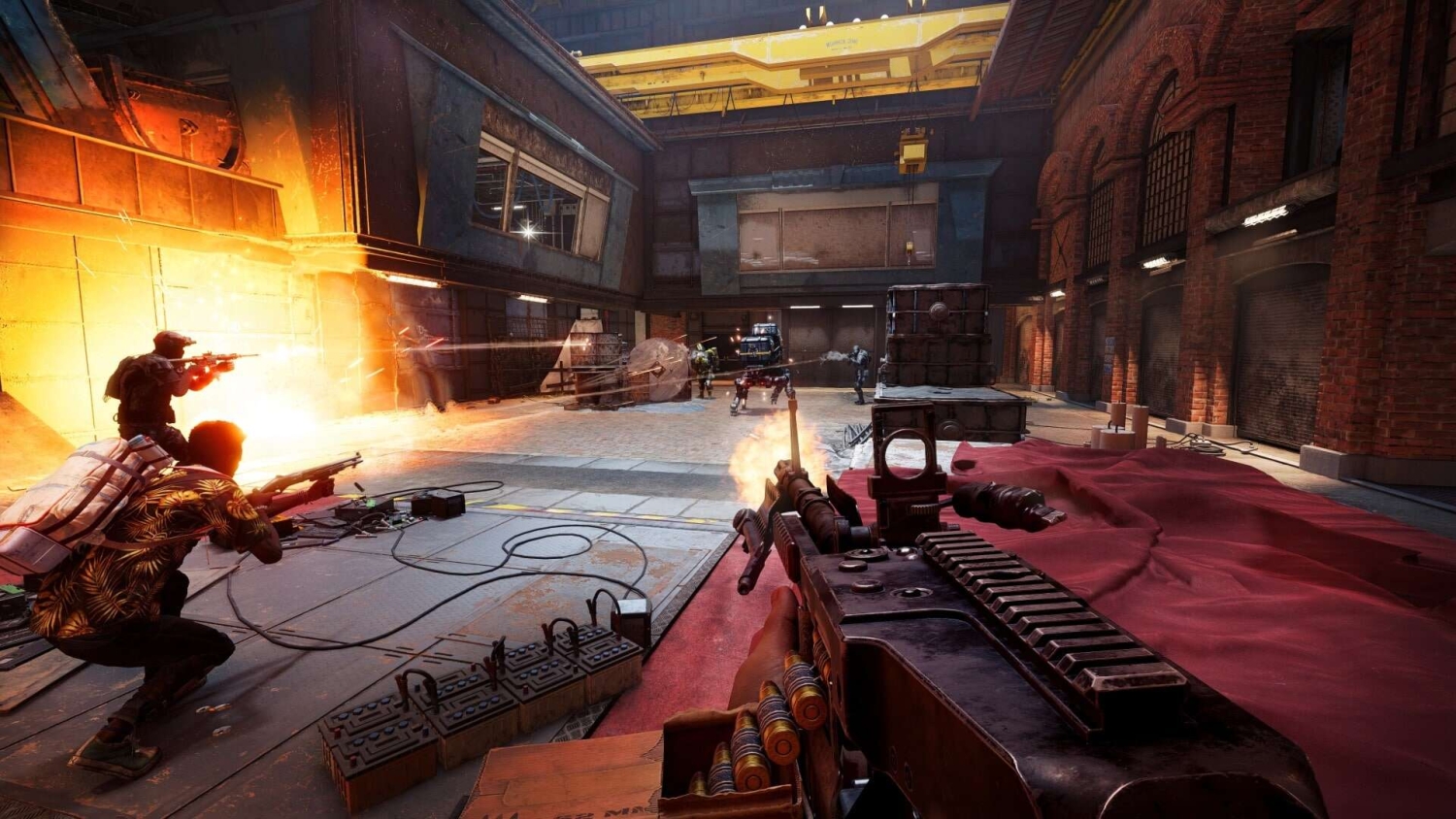 Players engaging in gunfire inside an industrial warehouse with weapons and explosions