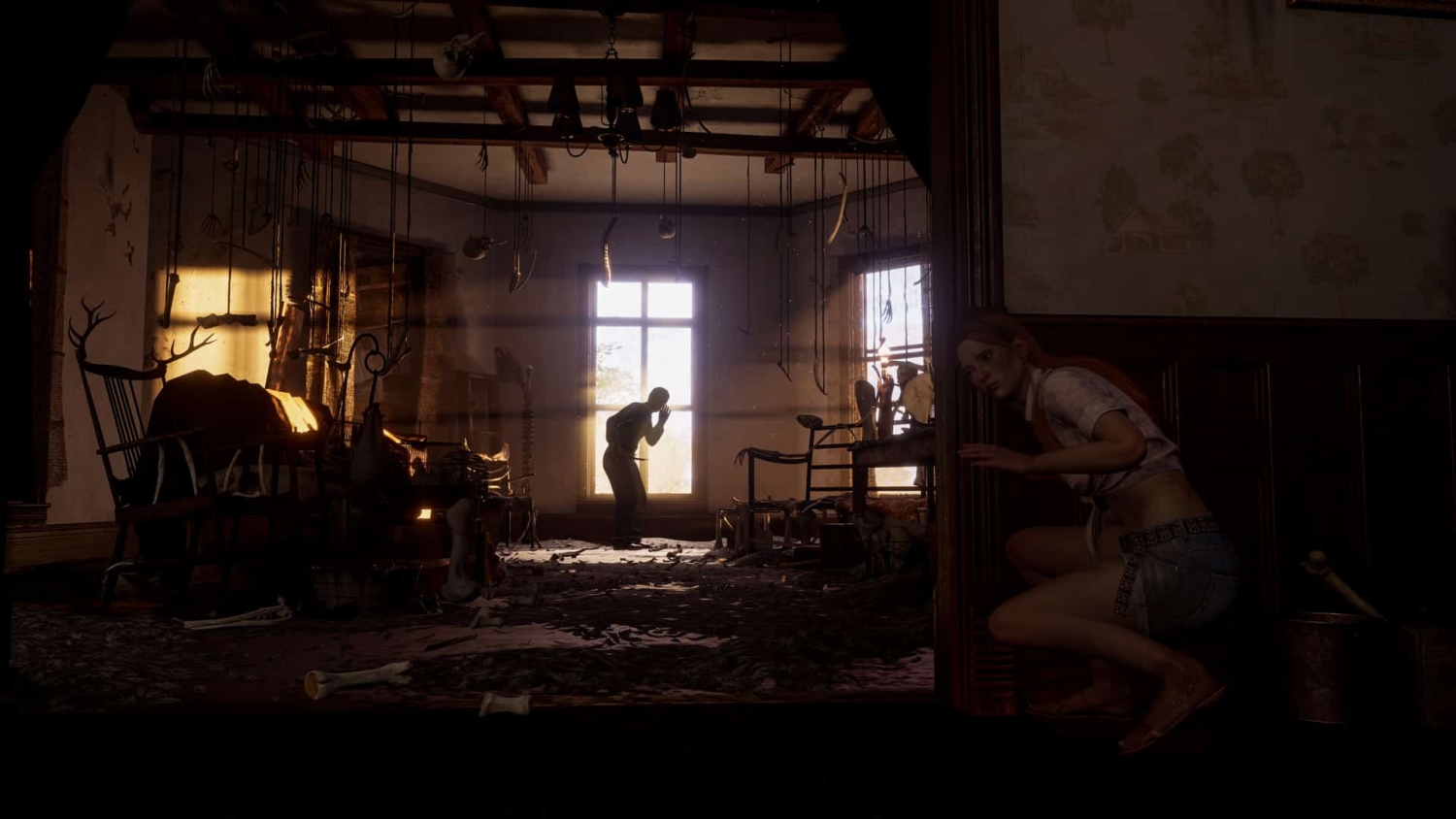 Woman crouching behind wooden doorway watching man in dimly lit room with bones and hanging objects