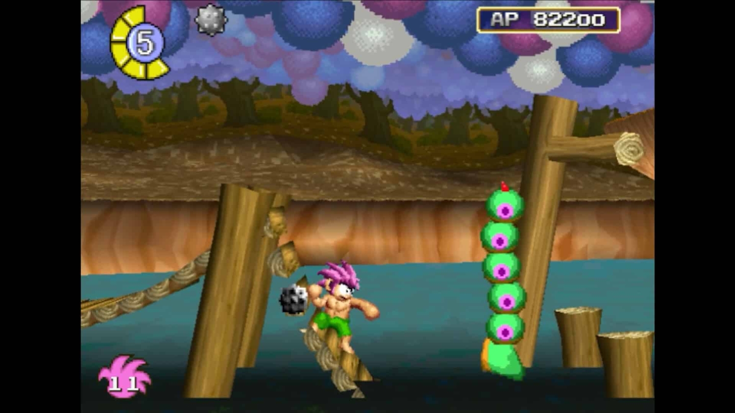 Pink-haired character in green shorts dodges a tall green segmented creature on wooden beams over water