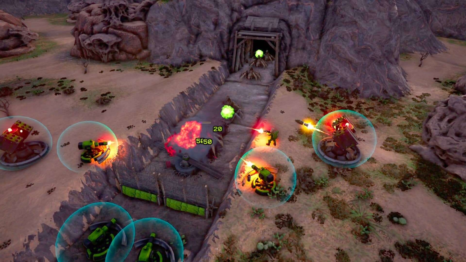 Turrets shooting at spider-like creatures emerging from a rocky tunnel in a desert terrain