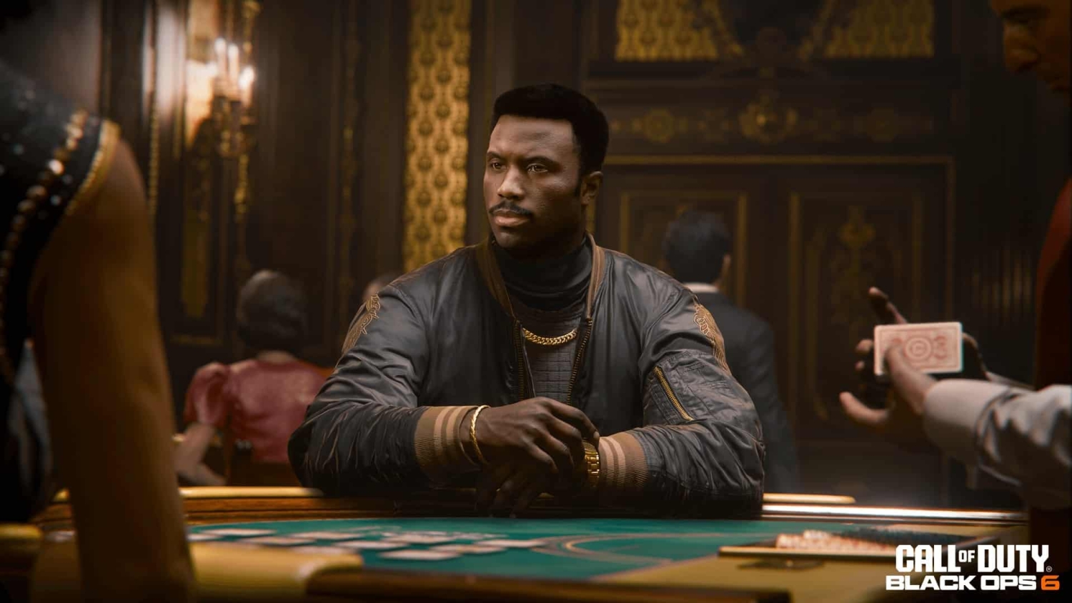 Man in dark bomber jacket sitting at a green card table in a richly decorated casino room