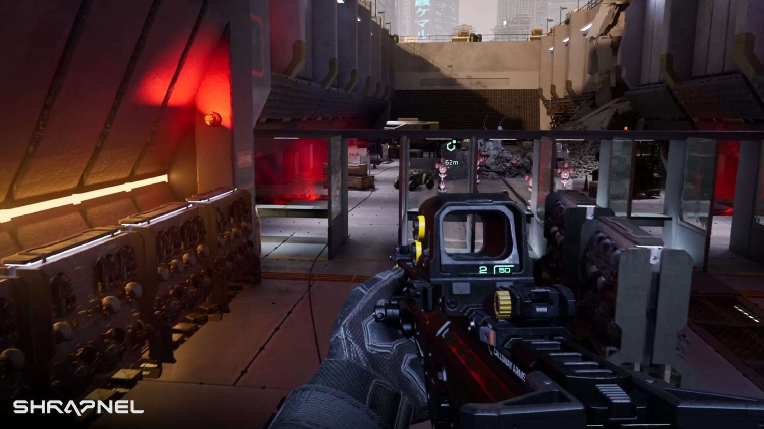 First-person shooter scene showing a gun aimed forward inside a futuristic industrial corridor with red and yellow lighting