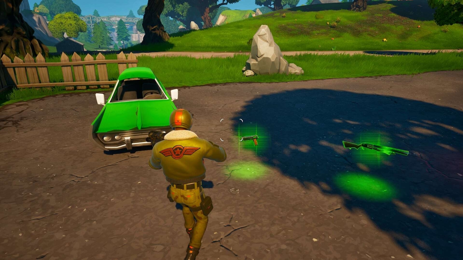 Game character in a green jacket approaching glowing weapons on the ground beside a bright green car in a Fortnite setting