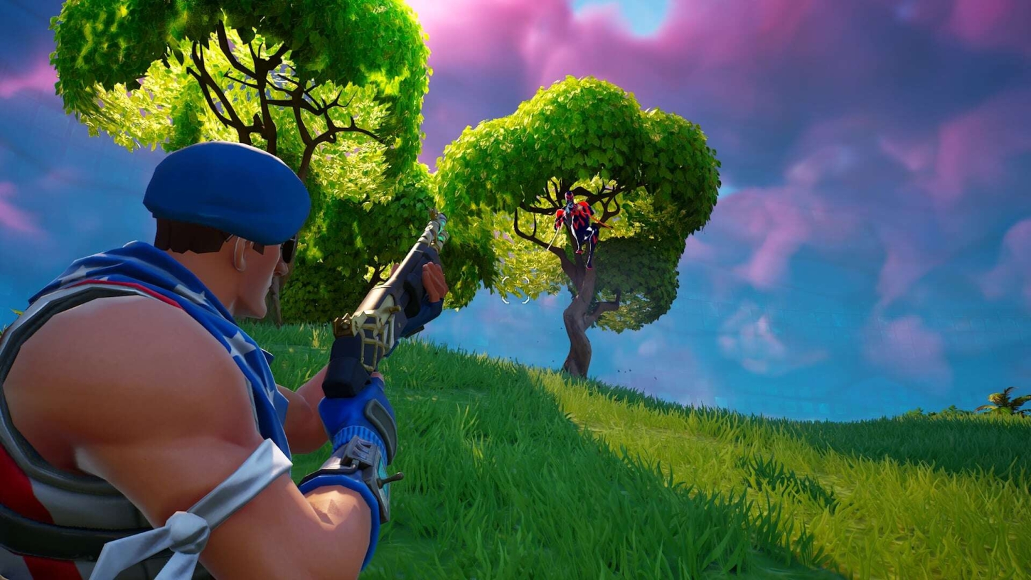 Player aiming a shotgun at an opponent sitting in a leafy tree under a vibrant purple sky