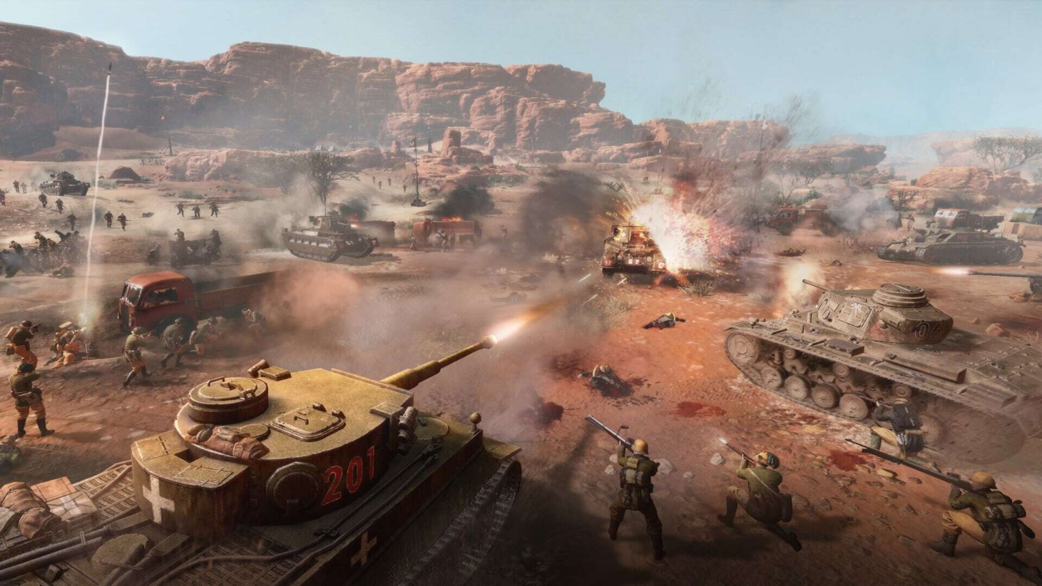 Tanks firing and soldiers advancing in a desert combat scene with explosions and rocky terrain