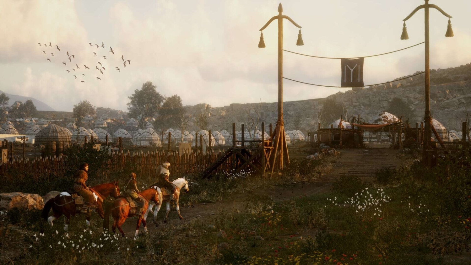Three riders on horseback approaching a wooden gate to a fortified camp with white tents and a black banner overhead