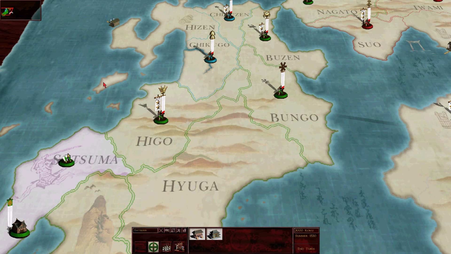 Detailed strategy map showing Japanese regions like Higo, Hyuga, Bungo with units positioned on territories