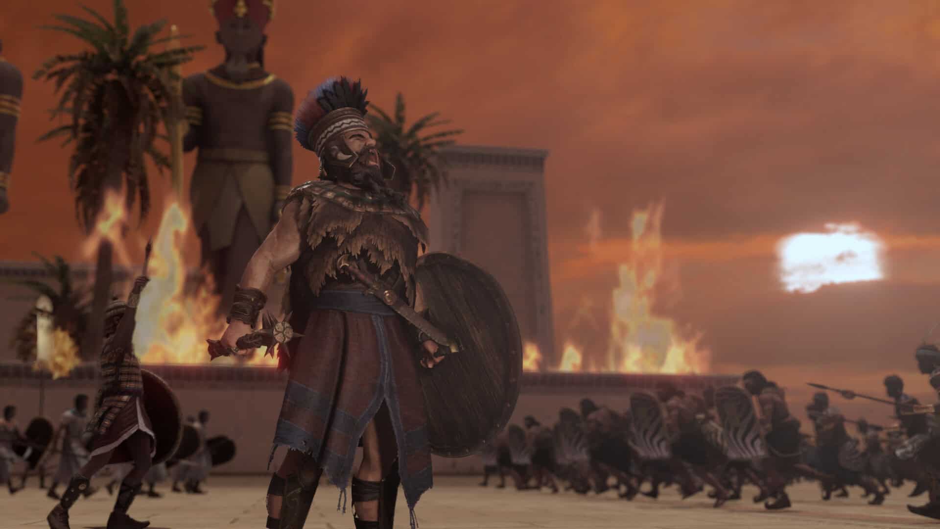 Armoured warrior with shield and mace leading troops in battle with flames and ancient statues at sunset