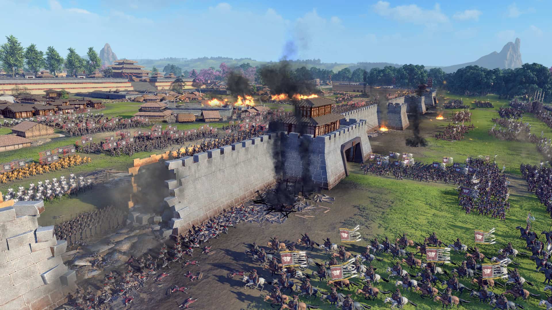 Medieval troops assaulting burning fortress walls with horses and banners in large-scale battle