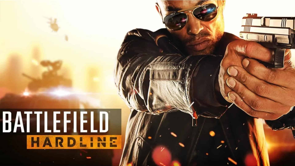 Man in black leather jacket and sunglasses aiming a pistol towards the viewer with a blurred background